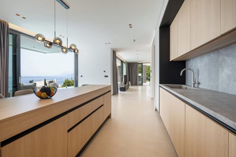 Panoramic Villa, Sea View | Private kitchen | Espresso maker, electric kettle, toaster, highchair