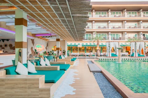 Outdoor pool, open 8:00 AM to 8:00 PM, free cabanas, pool umbrellas