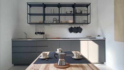 Fridge, microwave, stovetop, cookware/dishes/utensils