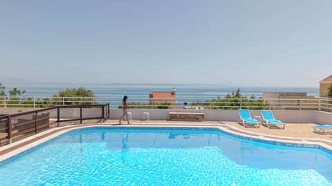 Seasonal outdoor pool, open 11:00 AM to 8:00 PM, sun loungers