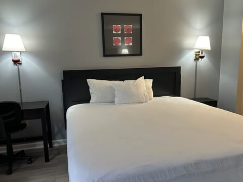 Desk, blackout drapes, iron/ironing board, free WiFi