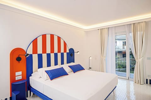 Junior Suite, Balcony, City View | In-room safe, soundproofing, iron/ironing board, free WiFi