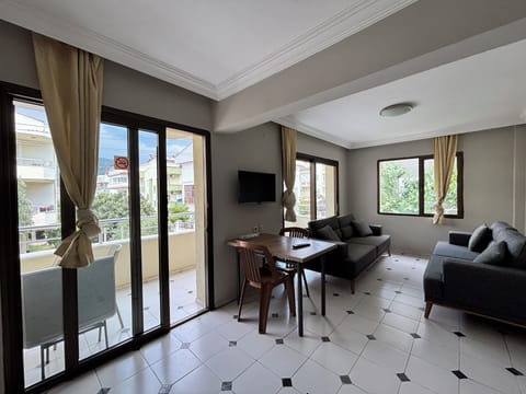 Family Apartment, 1 Bedroom, Balcony, City View | 1 bedroom, desk, laptop workspace, soundproofing