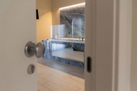 Deluxe Room, Balcony, Courtyard View | Blackout drapes, iron/ironing board, free WiFi