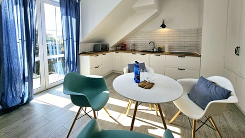 Comfort Apartment, Balcony | Living area | 50-inch LCD TV with cable channels