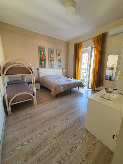 Family Quadruple Room, Balcony, Garden View | Desk, free WiFi, bed sheets