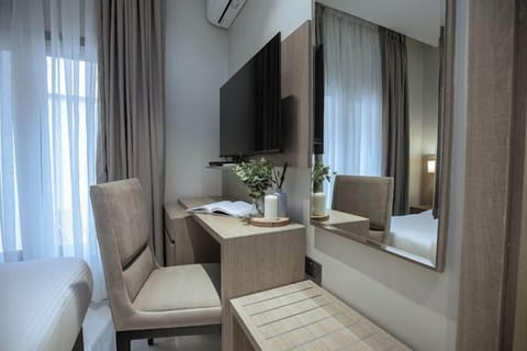Family Apartment, Balcony, City View | 1 bedroom, desk, laptop workspace, blackout drapes