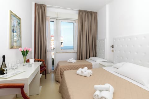 Triple Room, Balcony, Sea View | In-room safe, desk, soundproofing, free WiFi