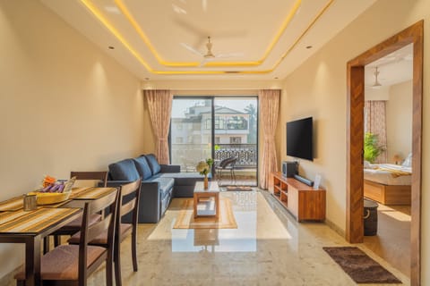 Apartment, 1 King Bed, Balcony, City View | Living area | Flat-screen TV