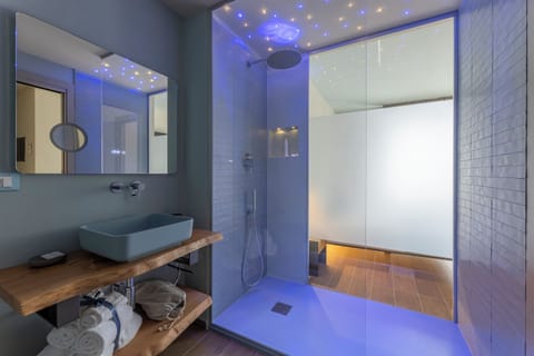 Panoramic Suite, Sea View | Bathroom | Shower, hair dryer, towels, soap