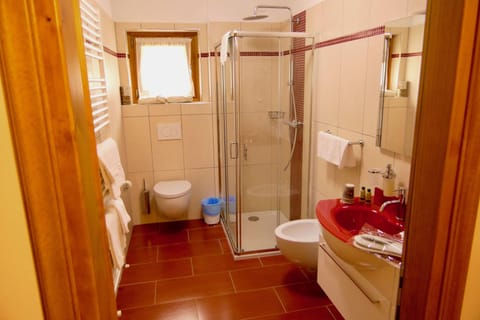 Family Triple Room, Mountain View | Bathroom | Shower, hair dryer, bathrobes, slippers