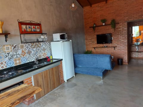 Chalet | Living area | 32-inch LCD TV with cable channels, fireplace, MP3 dock