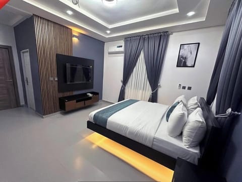 Family Room, Balcony, City View | Desk, laptop workspace, blackout drapes, soundproofing