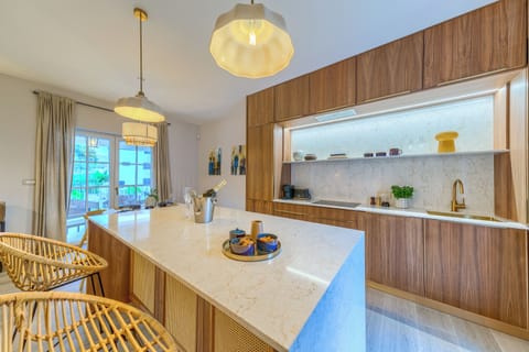 Deluxe Apartment, Pool View | Private kitchen | Coffee/tea maker, electric kettle