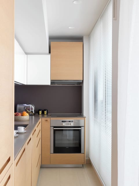 Garden Loft | Private kitchen | Full-size fridge, microwave, oven, stovetop