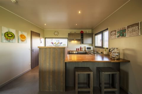 Villa, 4 Bedrooms | Private kitchenette | Full-size fridge, microwave, oven, stovetop