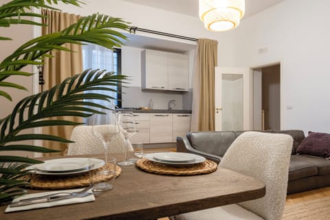 Apartment, 2 Bedrooms, Patio | Living area | Flat-screen TV