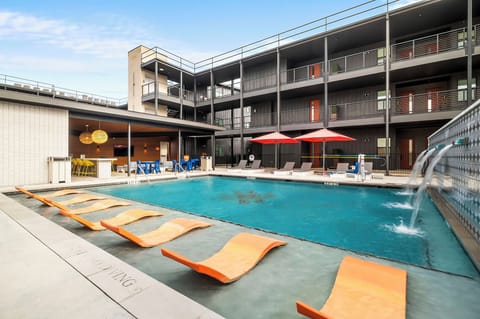 Outdoor pool, open 8:00 AM to 10:00 PM, pool umbrellas, sun loungers