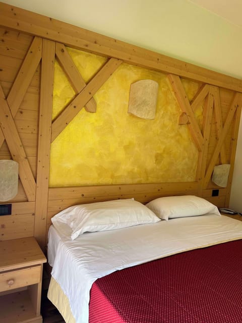 Deluxe Triple Room, Balcony, Mountain View | In-room safe, desk, free WiFi, bed sheets