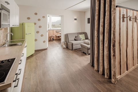 Superior Suite, Mountain View | Living area | TV