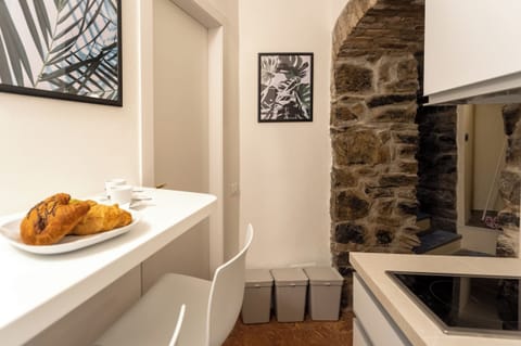 Apartment (1 Bedroom) | Private kitchen | Microwave, espresso maker, electric kettle, highchair