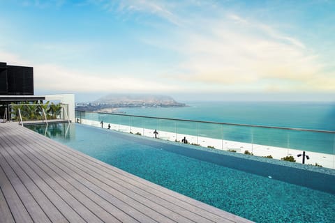 Outdoor pool, open 6:00 AM to 8:00 PM, pool umbrellas, sun loungers