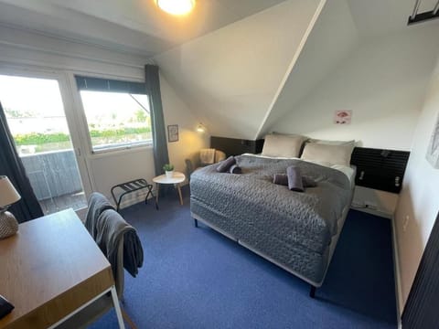 Comfort Double Room, Courtyard View | Desk, laptop workspace, blackout drapes, iron/ironing board