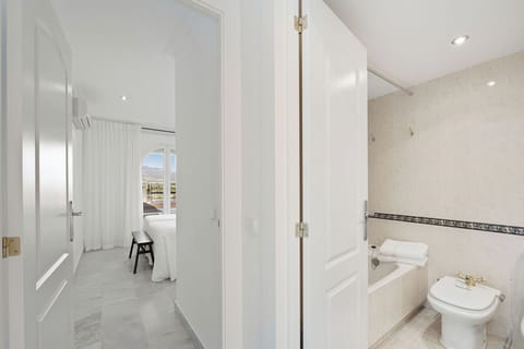 Exclusive Apartment, Ocean View | 2 bedrooms, blackout drapes, iron/ironing board, free WiFi