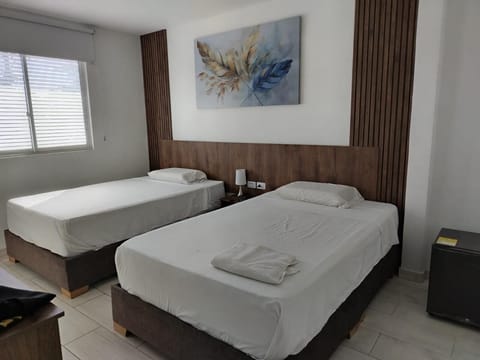 Comfort Quadruple Room | In-room safe, desk, laptop workspace, iron/ironing board