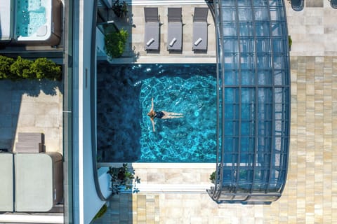Indoor pool, outdoor pool, open 8:00 AM to 8:00 PM, pool umbrellas