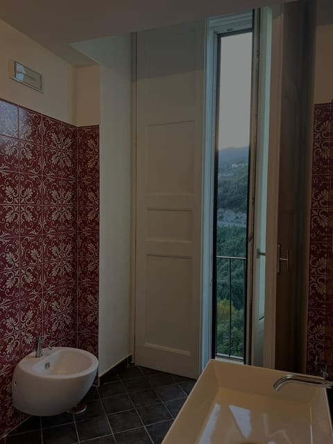Suite, Sea View | Bathroom | Hair dryer, towels