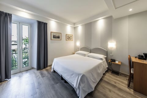 Comfort Double or Twin Room | 1 bedroom, minibar, in-room safe, desk