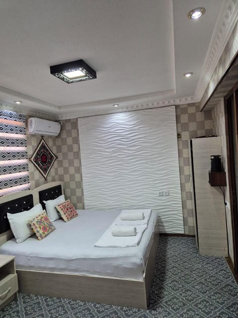 Twin Room, City View | Bathroom | Shower, hair dryer, slippers, towels
