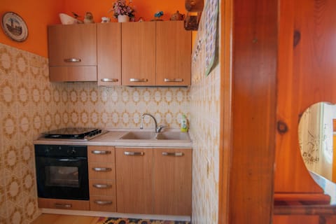 Apartment, Balcony | Private kitchen | Coffee/tea maker