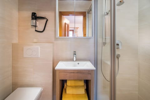 Shower, towels, soap, shampoo