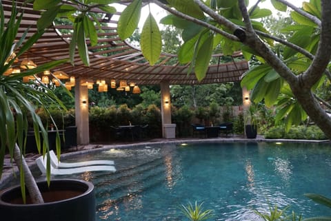 Outdoor pool, open 7:00 AM to 7:00 PM, sun loungers