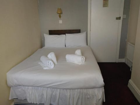 Desk, laptop workspace, free WiFi, bed sheets