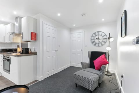 Apartment, Patio | Living area | 30-inch TV with digital channels