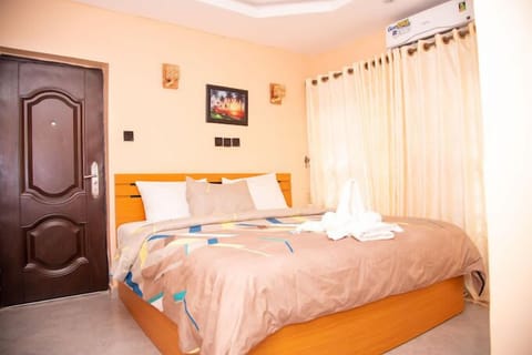 Deluxe Room, Balcony, City View | Desk, laptop workspace, blackout drapes, soundproofing