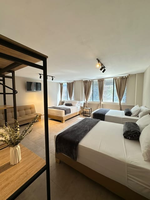 Basic Quadruple Room | Free WiFi, bed sheets