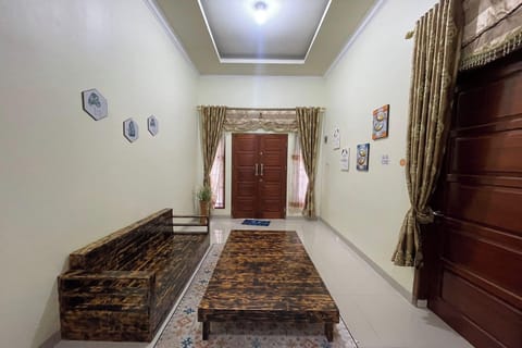 Villa | Living area | 32-inch flat-screen TV with cable channels