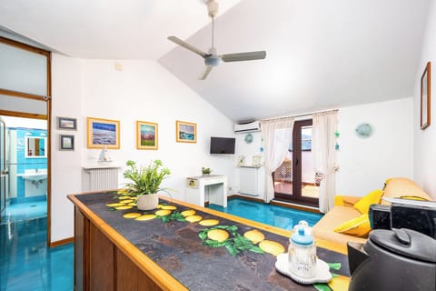 Panoramic Apartment, Partial Sea View | Living area | 30-inch flat-screen TV with digital channels