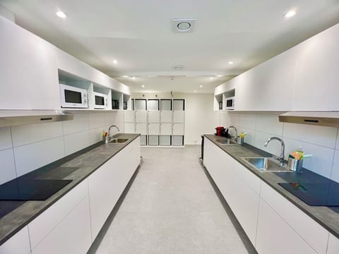 Mini-fridge, microwave, stovetop, cookware/dishes/utensils