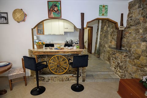 House, 2 Bedrooms | Living area | 32-inch flat-screen TV with digital channels