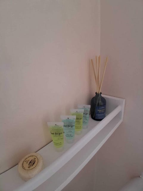 Shower, towels, soap, shampoo