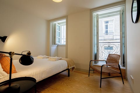 Apartment, Balcony, City View | 2 bedrooms, hypo-allergenic bedding, blackout drapes, iron/ironing board