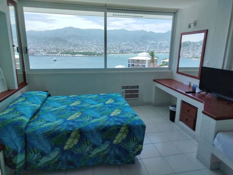 Standard Room, Sea View | 1 bedroom, iron/ironing board, free WiFi