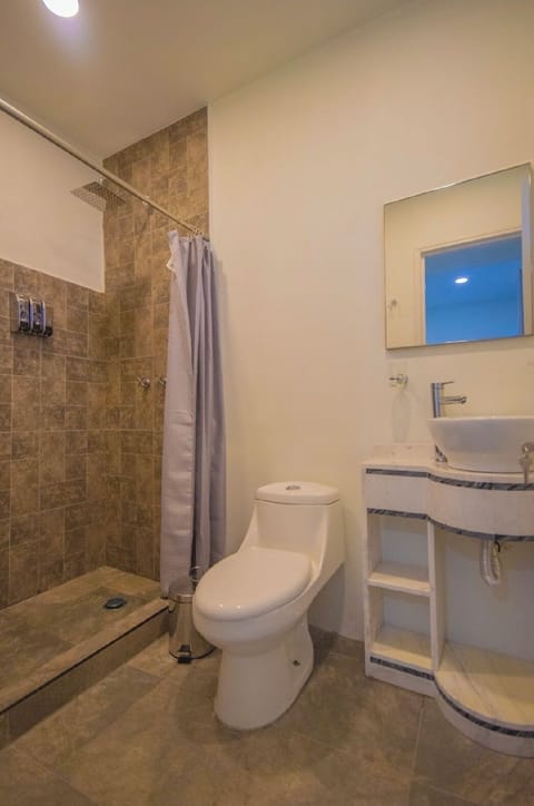 Comfort Double Room, Garden View | Bathroom | Shower, towels, soap, shampoo