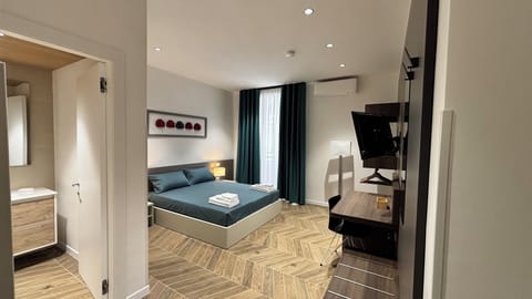 Deluxe Room, Balcony | Desk, laptop workspace, blackout drapes, soundproofing