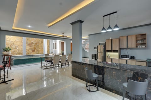 Villa, Patio, Pool View | Private kitchen | Dining table